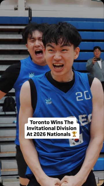 Two Toronto players in blue jerseys celebrating with open-mouthed shouts, captioned Toronto Wins The Invitational Division At 2026 Nationals.