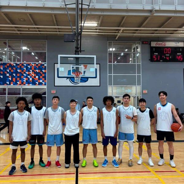 The Chicago squad in pale blue and white jerseys, lined up in front of the scoreboard.