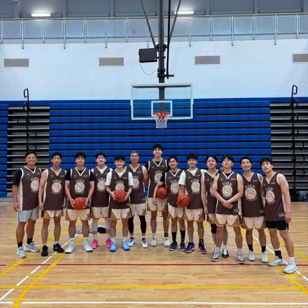 The Silicon Valley squad in brown and cream SVKB jerseys, lined up across the key.
